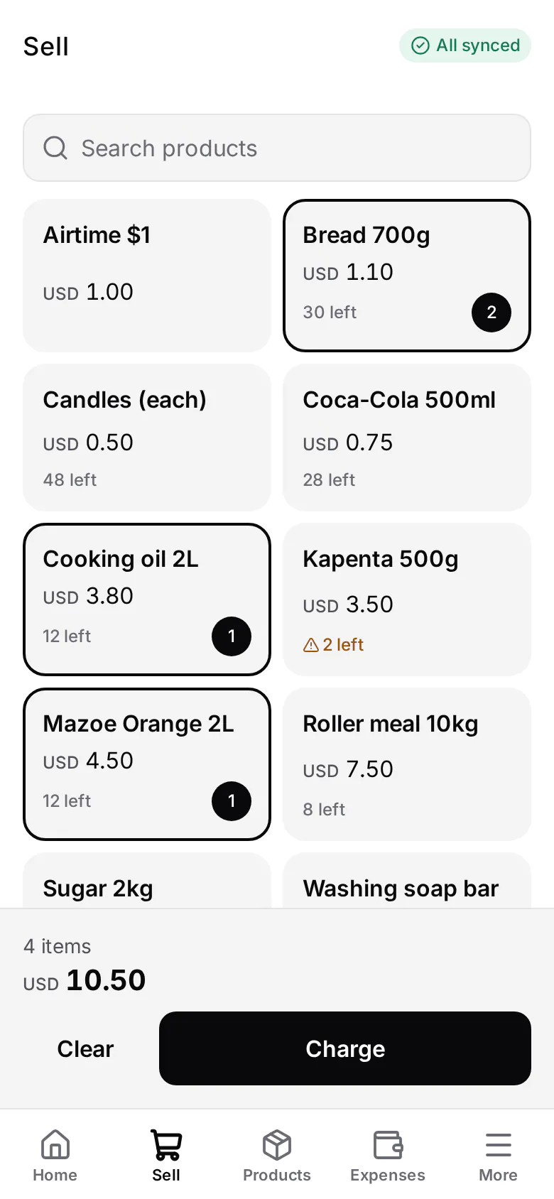 ShopFlow's Sell screen: products with their prices and how many are left, four items picked, a total of USD 10.50 and a Charge button
